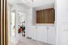 Laundry Cabinet in between 1st and 2nd Guest Rooms