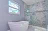 Primary bath w/ similar finishes