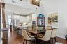 The dining room space is large enough for a permanent 6 seat dining table
