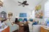 The pendant ceiling fan gently circulates the air throughout the townhome.