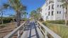 Walkway to intracoastal-pools & clubhouse