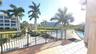 View of large heated pool + spa