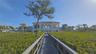 Walkway to pools & clubhouse