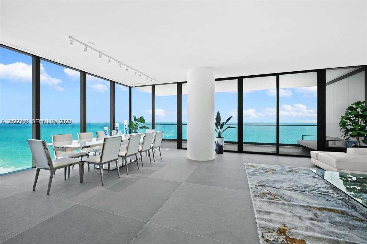 Direct ocean views from the spacious ldining area with floor-to-ceiling glass.