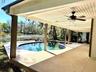 Large Open Lanai and Pool and Lake