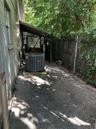 ConcreteDog run with covered Porch or Chicken Coop all fenced