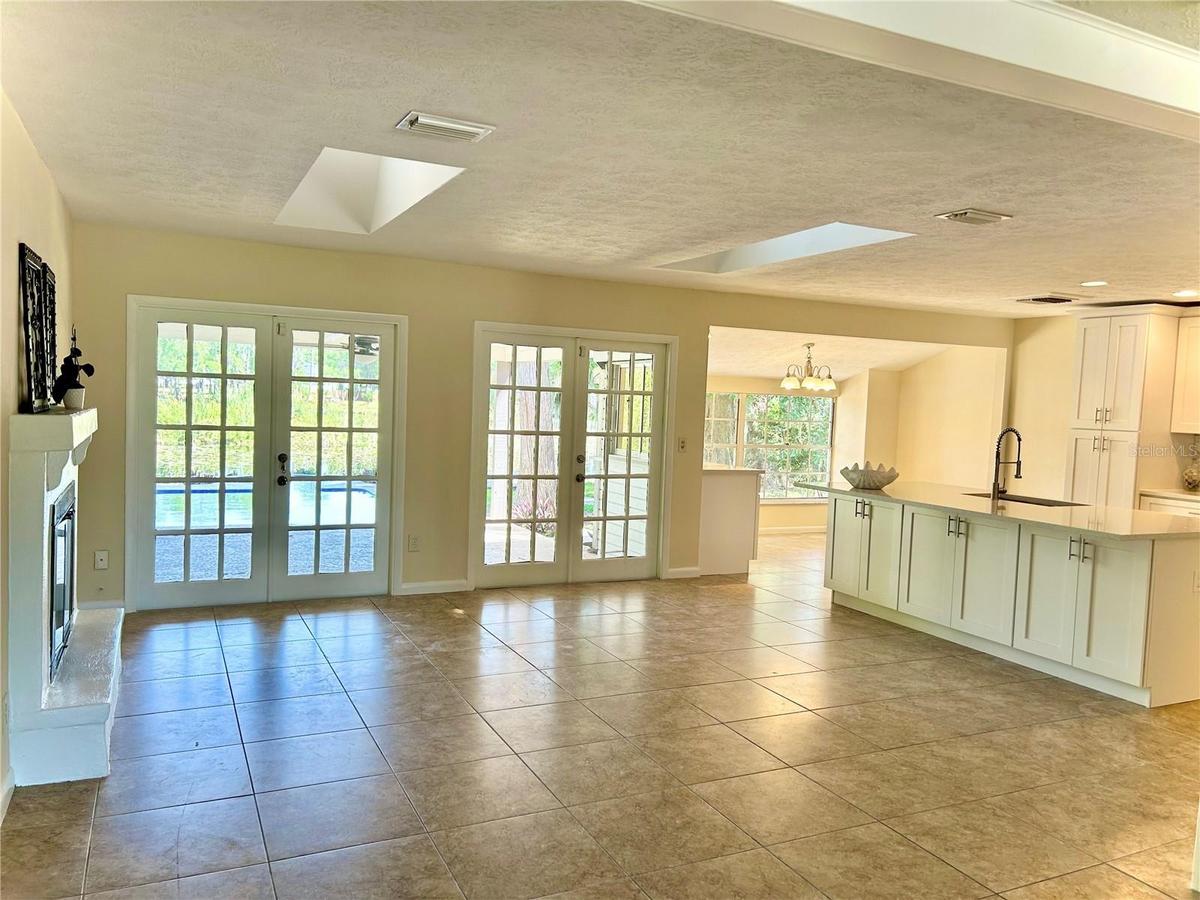 Great Room with Skylights and French Doors