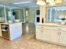 Pass Thru and Dry Bar looking to Great Room and Entry