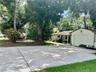 View of Oversized Driveway and Home