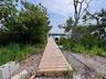 Bayfront lot's dock that home has access to. Bay front lot is available for separate sale.