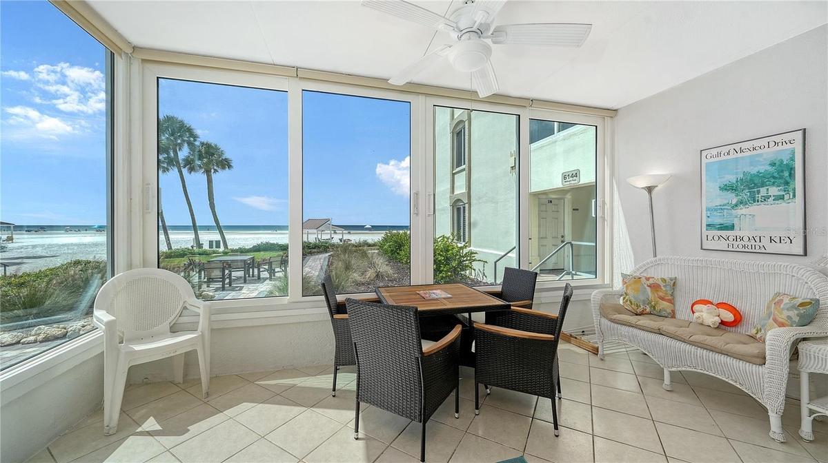 View from the living room and glassed-in lanai. Walk right out to Siesta Key Beach!