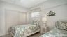 Two twin beds and good closet space.
