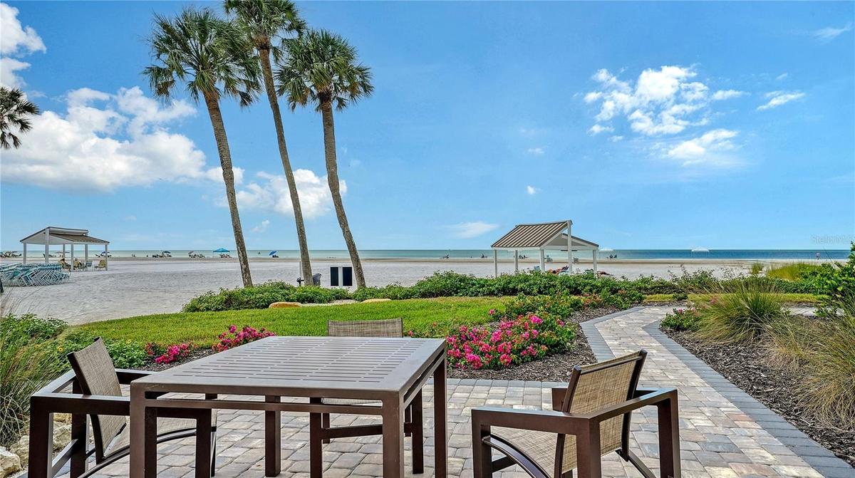 Enjoy the amazing sunsets year-round from the provided tables, chairs, and chaise lounges