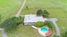 Aerial house and pool.