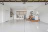 Garage with washer/dryer.  New epoxy.