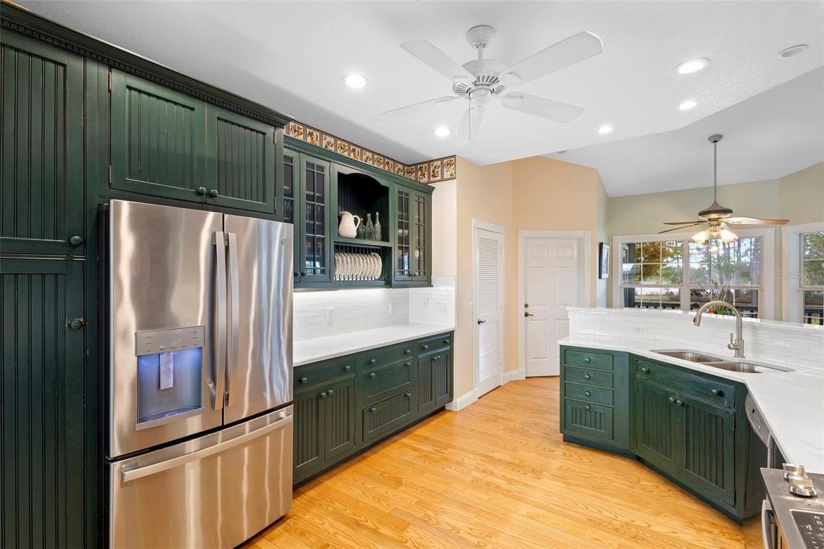 From kitchen office towards kitchen table.