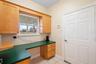 Kitchen desk/office by garage door.