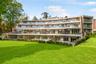 	The Pavilion crescent apartments overlooking parkland at Sunningdale Park, Ascot