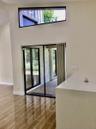 TO SCREENED PATIO