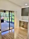 TO SCREENED PATIO