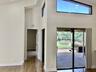 TO SCREENED PATIO