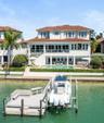 Spectacular deep-water view from your private pool/spa, dual lanais, custom outdoor kitchen or boat dock with 13,000lb boat lift& 75' waterfront