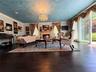 Rich wood-finish flooring throughout