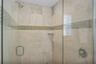 Main floor primary bedroom walk-in shower