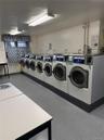 ALL NEW WASHER MACHINE LOCATED IN THE BASEMENT