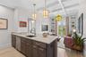 Leathered marble countertops in kitchen & bathrooms