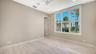 Bedroom #4 with wood plank porcelain tile floors