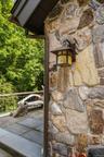Detail of lights, copper gutter and rock wall