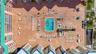 Aerial of Pool Area at Beach Cottages!