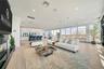 Living room with visible vents, recessed lighting, and light wood finished floors