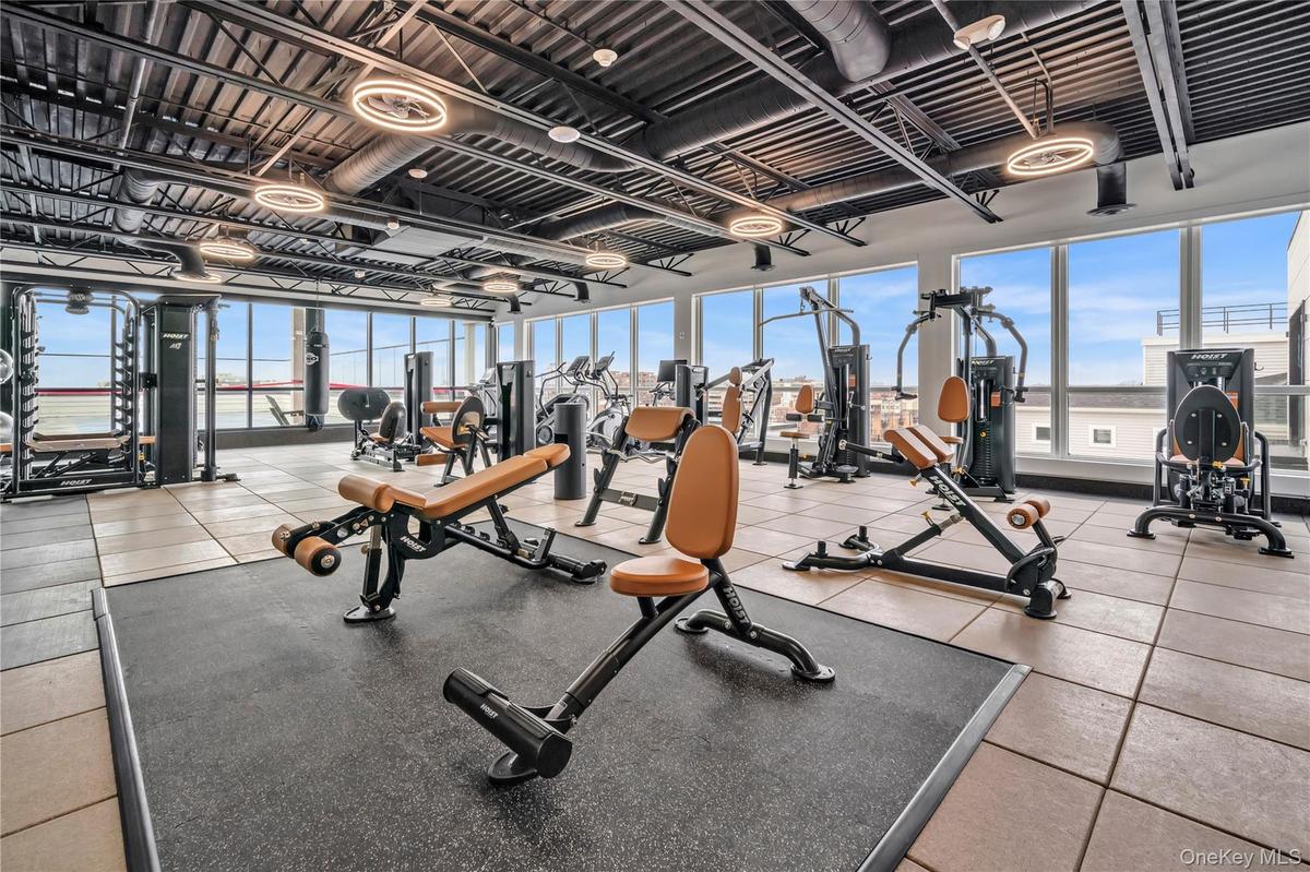 Exercise room featuring plenty of natural light