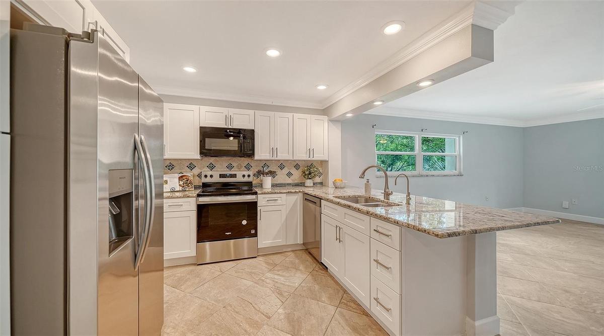 New stainless GE, Whirlpool, Frigidaire, and LG appliances.