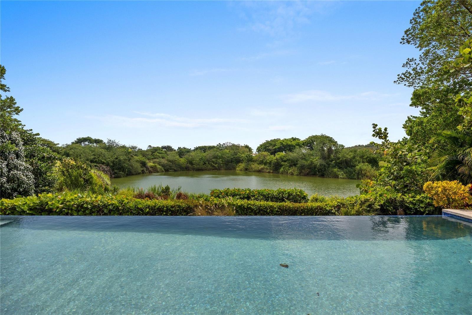 Nestled within the highly sought-after gated community of Sabanera Dorado, this exceptional Carbia model sits on one of the neighborhood's most desira