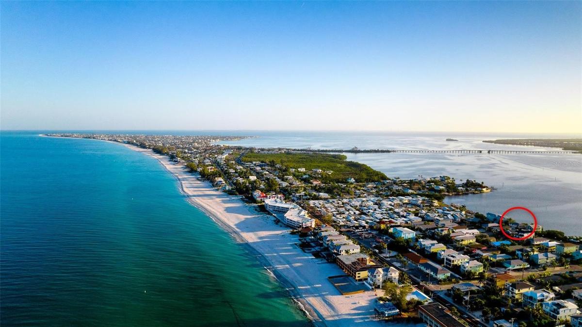 Nearly 100 feet of direct Sarasota Bay frontage with panoramic open-water views.