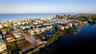 Panoramic Sarasota Bay views from one of the island's most exceptional waterfront parcels.