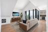 Welcome to this special unit with a Loft, 17 ft. vaulted ceilings and ample light. Motorized shades for the double doors in Living Area & Kitchen.