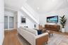 Sofa in this location leaves a hallway to Kitchen