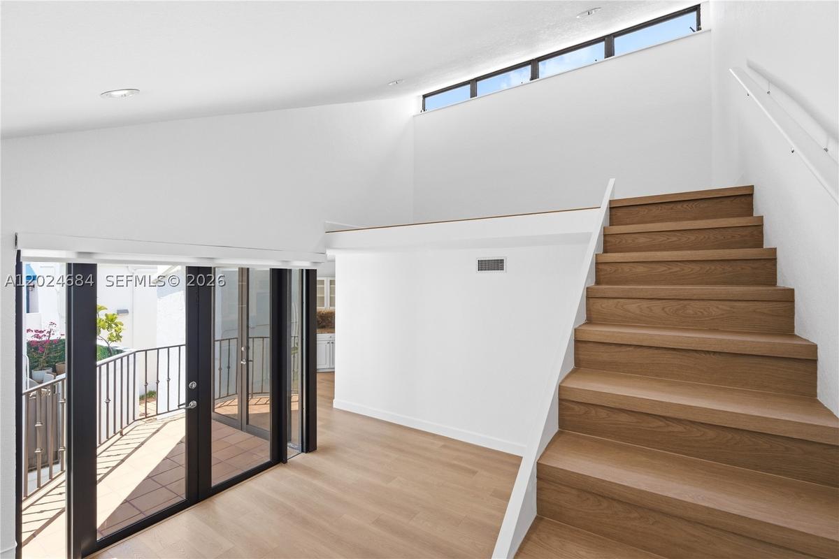Loft is the perfect space for a home office. Plenty of space for large L-Shaped desk, filing cabinet(s), and bookshelf