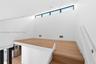 Loft is the perfect space for a home office. Plenty of space for large L-Shaped desk, filing cabinet(s), and bookshelf