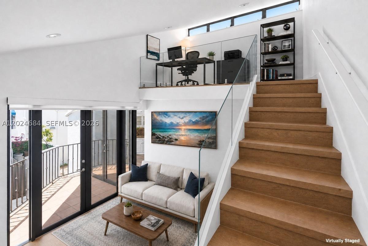 Loft is the perfect space for a home office. Plenty of space for large L-Shaped desk, filing cabinet(s), and bookshelf