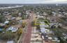 Aerial View of Two Story home with wide brick streets