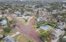 Aerial View of Two Story home with wide brick streets
