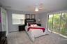 Professionally Staged Photo of Second Floor Primary Bedroom taken after renovation