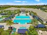 Resort-style pool complex with cabanas and lap pool