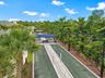 Bocce courts with shaded seating areas