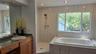 Primary bathroom dual sink. Jacuzzy tub
